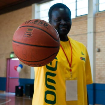 Man grabbing a basketball