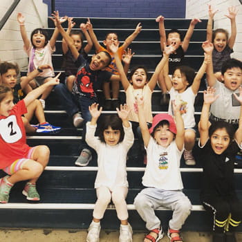 kids sitting on the stairs